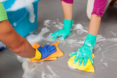 Staff separating packaging and recycling materials during carpet cleaning operations